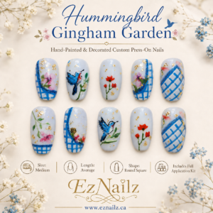 Hummingbird Gingham Garden is a hand-painted and decorated press-on nail set featuring soft blue gingham accents, delicate florals, hummingbird artwork, and gold foil details. Size: Medium Length: Average Shape: Round Square Set includes: Full application kit A similar set can be created in a different size for custom fit by request — see Custom Order Request.